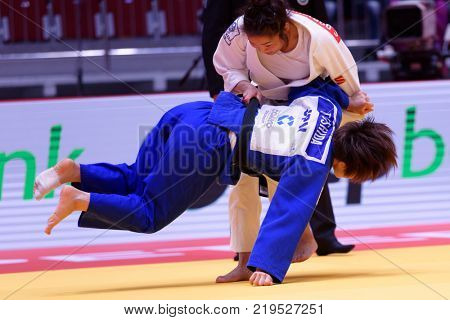 ST. PETERSBURG, RUSSIA - DECEMBER 16, 2017: Final fight Sumiya Dorjsuren, Mongolia (white) vs Tsukasa Yoshida, Japan during Judo World Masters tour. Dorjsuren won gold medal