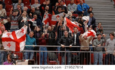 ST. PETERSBURG, RUSSIA - DECEMBER 17, 2017: Georgian fans celebrating the gold medal of Guram Tushishvili, Georgia in Men O100 during Judo World Masters 2017