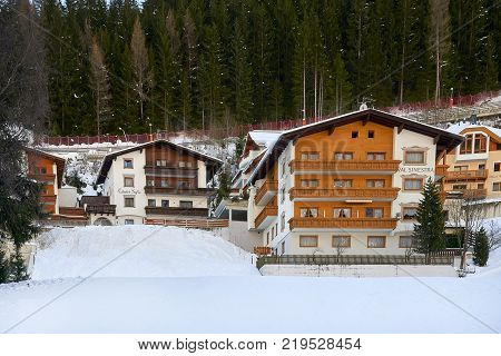 Ischgl, Austria - December 24, 2017: Austrian Alps ski resort Ischgl. Hotels on mountainside. Hotels are built in traditional Tyrol architecture style.