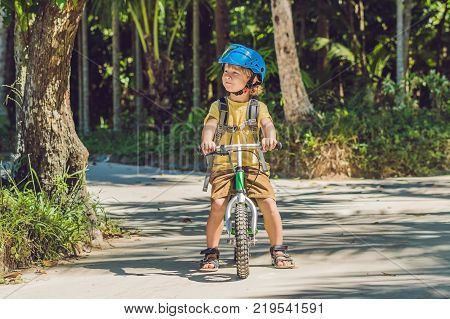 Little Boy On A Bicycle. Caught In Motion, On A Driveway Motion Blurred. Preschool Child's First Day
