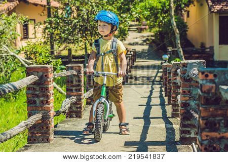Little Boy On A Bicycle. Caught In Motion, On A Driveway Motion Blurred. Preschool Child's First Day