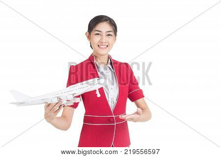 Portrait Of Asian Air Hostess Holding Airplane Model And Passport, Woman Stand And Smile, Woman With