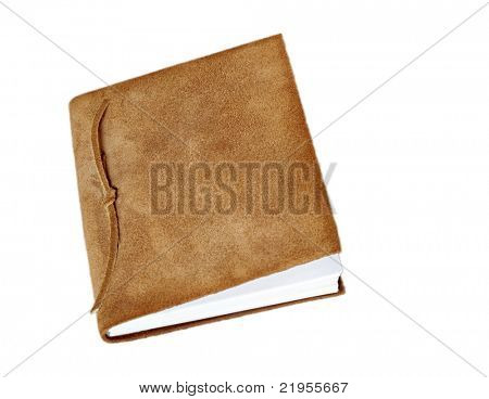Kniha Rust Suede izolovaných na bílém pozadí