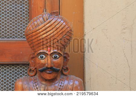 Udaipur India - October 15, 2017: Wooden Carving Of Indian Man Display At Souvenir Shop In Udaipur