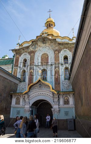 KYIV, UKRAINE - JUNE 1, 2017, People standing near to the main gates of the Pechersk Lavra in Kyiv