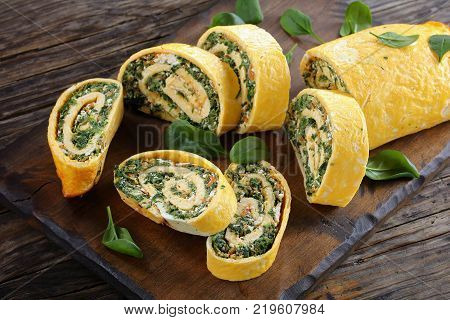 Egg And Cheese Roulade With Spinach And Feta