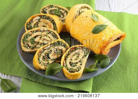 Egg And Cheese Roulade With Spinach And Feta