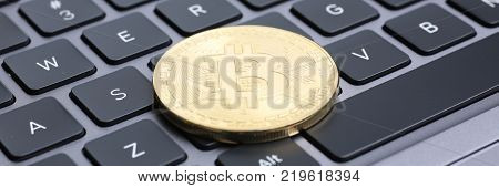 bitcoin on laptop keyboard exchage crypto currency mining
