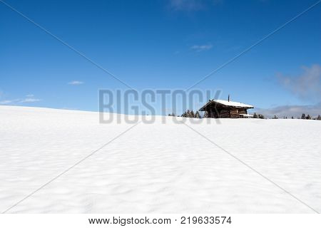 South Tirol Snow Landscape And Wooden Cabin