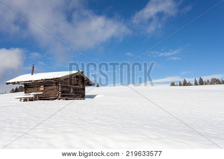 South Tirol Snow Landscape And Wooden Cabin