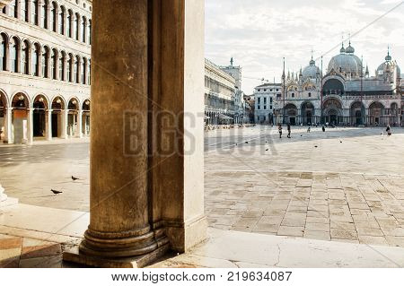 St. Marks Cathedral and square in Venice, doves and peolple.