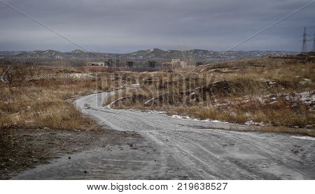 Winter steppe landscape. Thaw. Grunge nature. Grunge landscape
