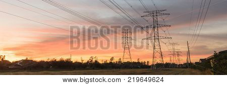 Industrial Background Group Silhouette Of Transmission Towers Sunset