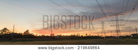 Industrial Background Group Silhouette Of Transmission Towers Sunset