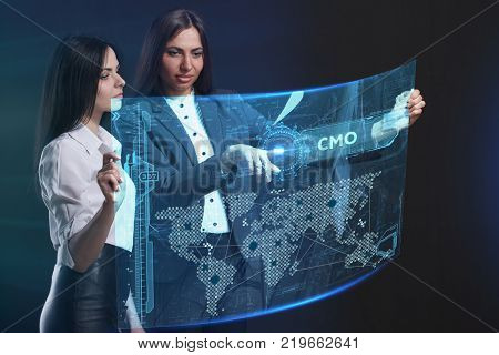The Concept Of Business, Technology, The Internet And The Network. A Team Of Business Women Working