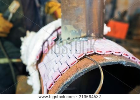 Welder In The Shop Weld Sample From The Tube With Concomitant Heating For Attestation
