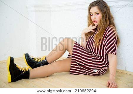 A portrait of a girl model in a stdio