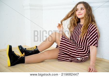 A portrait of a girl model in a stdio