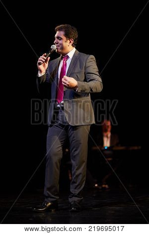 MOSCOW, RUSSIA - OCT 21, 2017: Yasser Alama professional singer and composer, organizer of 12th international festival of oriental dance ASSEMBLY 2017 on stage of Luna Theatre during Gala Concert.