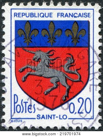 FRANCE - CIRCA 1966: A stamp printed in France depicts Arms of Saint-Lo circa 1966