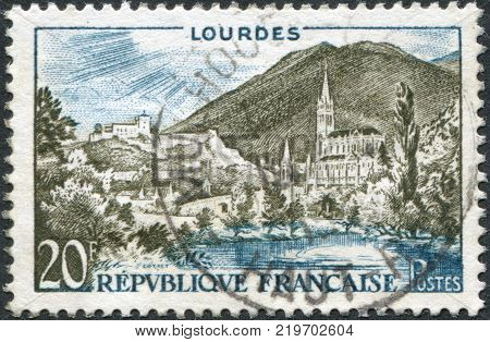FRANCE - CIRCA 1958: A stamp printed in France view and Lourdes Rosary Basilica circa 1958