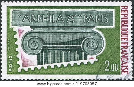 FRANCE - CIRCA 1975: A stamp printed in France is dedicated to Arphila-75 International Stamp Exhibition shows the Ionic Capital circa 1975