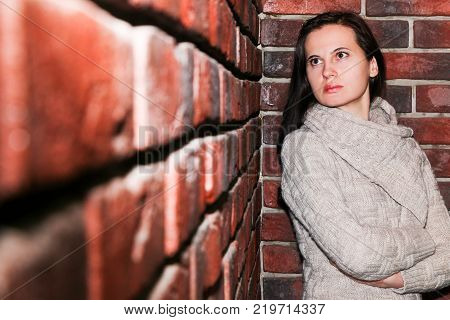 Portrait Of The Young Woman Up To Shoulders At A Wall