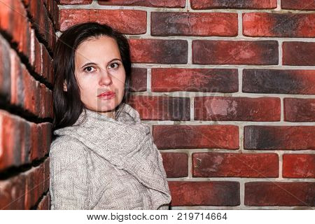 Portrait Of The Young Woman Up To Shoulders At A Wall
