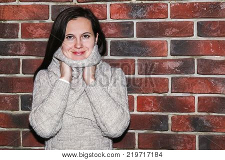 Portrait Of The Young Woman Up To Shoulders At A Wall