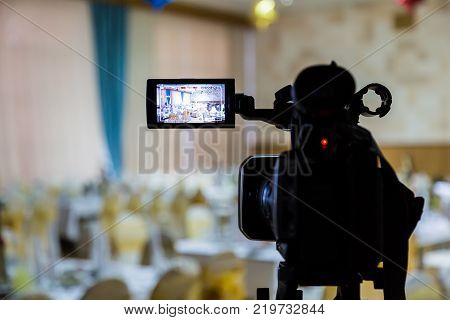 Filming of the event. Videography. Served tables in the Banquet hall.