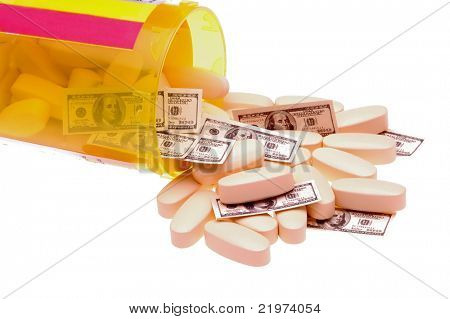 Pastillas & cien billetes de un dólar se derrame de botella de la prescripción