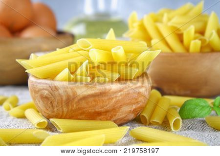 Penne rigate. Macaroni in the form of feathers. mostaccioli pasta