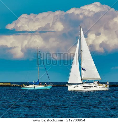 Sailboats Traveling By Baltic Sea