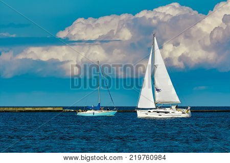 Sailboats Traveling By Baltic Sea