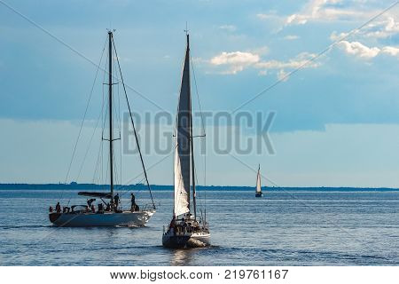 Sailboats Traveling By Baltic Sea