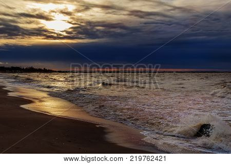 Waves beating against Latvia.Liepaja.Karosta. described the fortress ruins