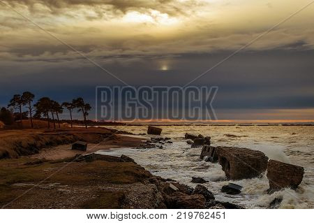 Waves beating against Latvia.Liepaja.Karosta. described the fortress ruins