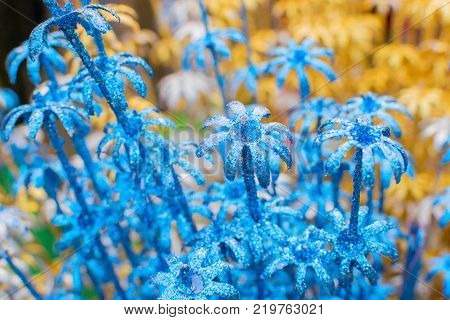 spongewood made artificial colored flowers handicrafts on display in Handicraft Fair in Kolkata - the biggest handicrafts fair in Asia.