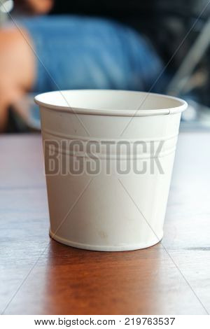 White aluminium bucket for decoration in coffee shop