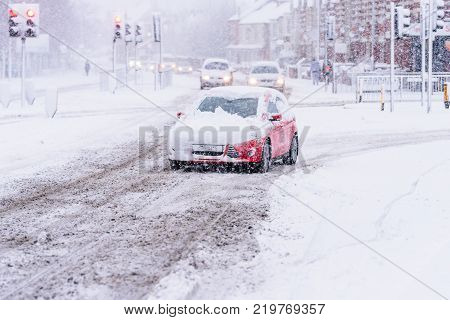 Driving in snow storm on British Road.