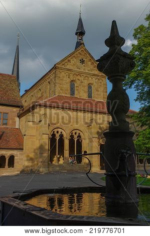 MAULBRONN, GERMANY - MAI 17, 2015: row of Tudor style houses at the monastery courtyard in Maulbronn. Cistercian Monastery Maulbronn is part of the UNESCO World Heritage Site.