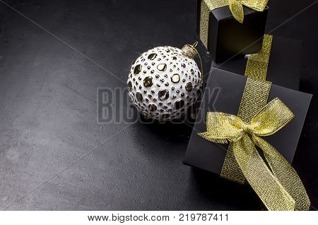 Red Christmas  Gift  Box With Red Ribbon And Fir Branches