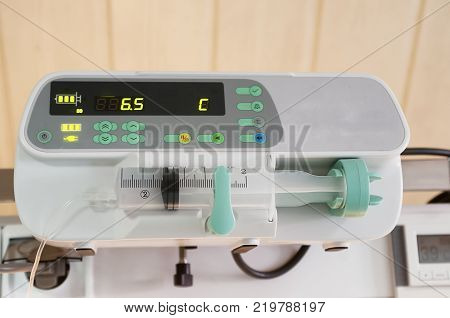A syringe driver or syringe pump is a small infusion pump