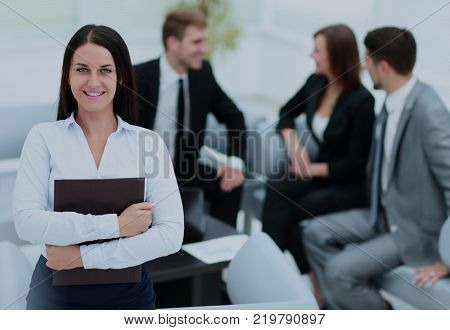 Business people working around table in modern office