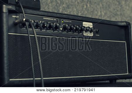 Guitar amplifier. electric tube amplifier for guitarist in record studio or live performance concert, rock, jazz, country, folk, pop, heavy metal, classic and more