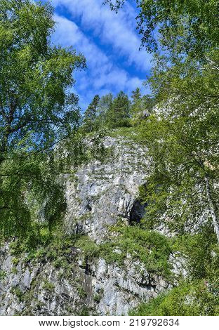 Tavda caves (tavdinskiye peshchery) - karst mountain massif with an extensive chain of caves landmark of Altai mountains Russia Siberia