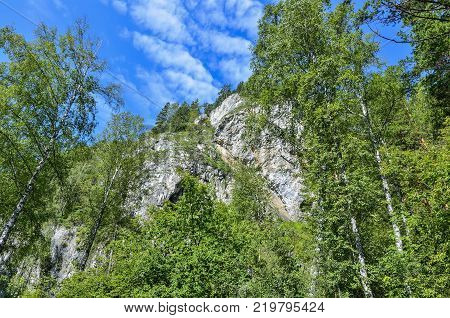 Tavda caves (tavdinskiye peshchery) - karst mountain massif with an extensive chain of caves landmark of Altai mountains Russia Siberia