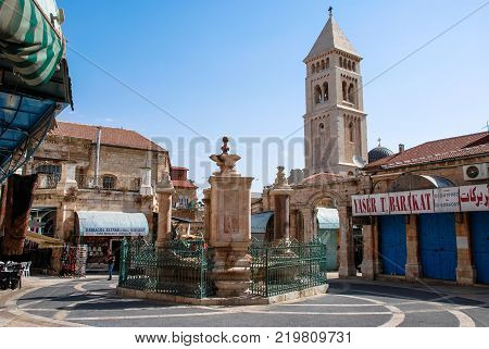 JERUSALEM ISRAEL - AUGUST 05 2010: Vertical picture of Suq Aftimos the market in Muristan Street in the old city of Jerusalem Israel.