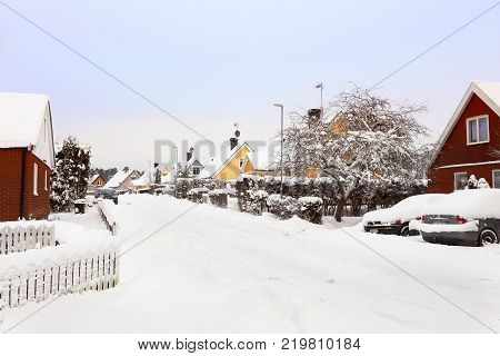 Sodertalje Sweden - February 3 2017: Winter in the residental area Vibergen populated with single family houses.