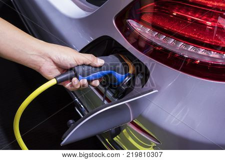 The Electric Vehecle ( EV ) charger ; selective focus
